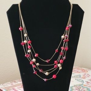 Red and gold bead necklace